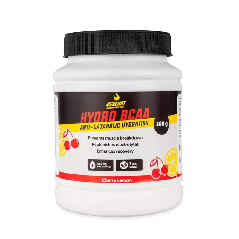 4Energy Hydro BCAA - 300 g gusto limone, contenitore bianco con coperchio nero, illustrazioni di ciliegia e limone, testo sul supporto muscolare.