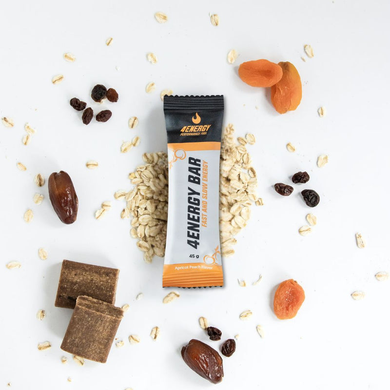 4Energy 4Energy Bar Box - 10 x 45 g albicocca e pesca, confezione adatta ai vegani con illustrazioni di albicocca e pesca e codice QR.