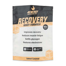 4Energy Recovery Whey Formula - 900 g gusto caramello salato, confezione nera con dettagli arancioni, testo sui benefici e chiusura richiudibile.