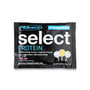 Select monodose - 16 g gusto cake pop, bustina nera con immagine del cake pop, grande logo Select Protein e testo dei benefici.